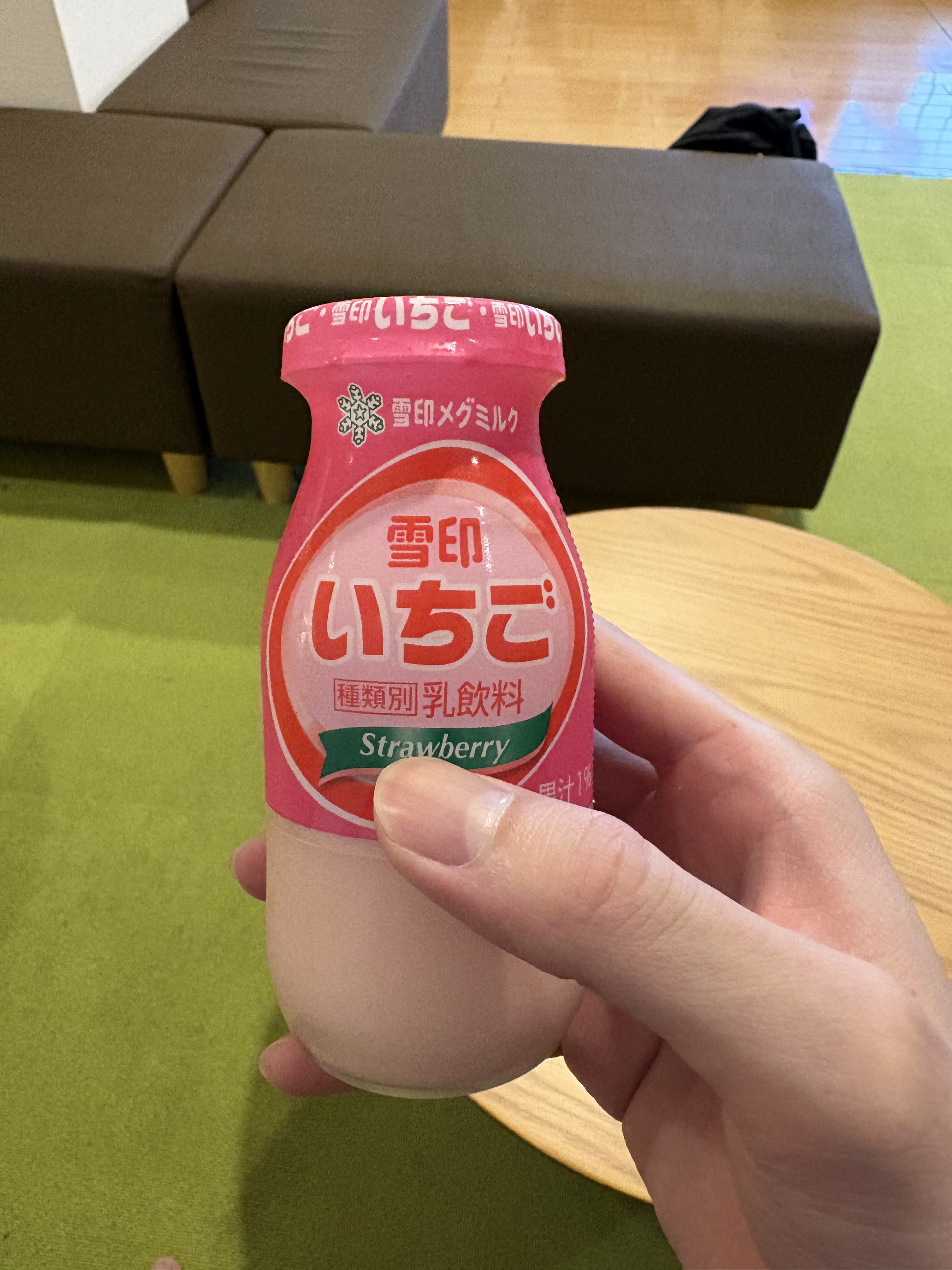 A bottle of Yukijirushi strawberry milk in the lounge at Miura-yu